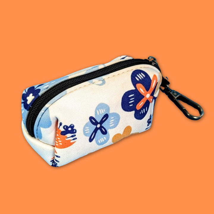 Distributeur fleuri de sacs à déjections pour chien aux tons bleu et orange