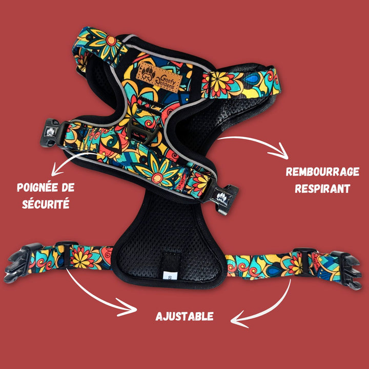 Un harnais anti-traction de la gamme Mandala, présenté à plat et ouvert afin de distinguer le double rembourrage,la poignée de sécurité et les boucles d'ouverture.