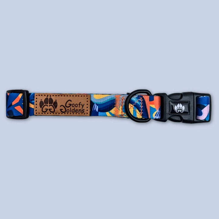 Le collier Lagon de la marque Goofy Goldens met en valeur son anneau d’attache robuste, sa boucle de fermeture gravée du logo, ainsi que son système de réglage facile et ajustable.