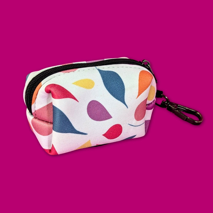 distributeur de sacs à cacas pour chien de la gamme pétales rose bleu jaune et orange