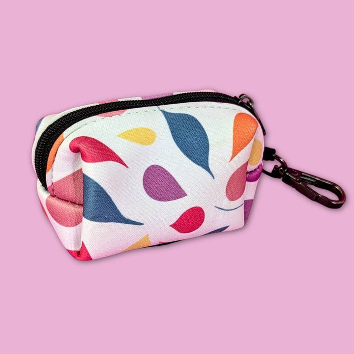distributeur de sacs à cacas pour chien de la gamme pétales rose bleu jaune et orange