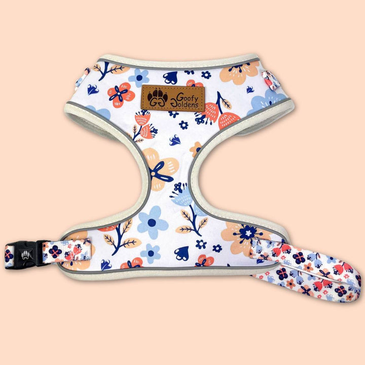 Harnais pour chien original aux motifs fleuris bleus, jaunes et orange de la marque Goofy Goldens.