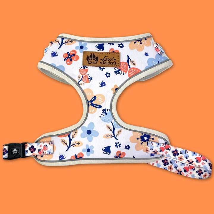 Harnais pour chien original aux motifs fleuris bleus, jaunes et orange de la marque Goofy Goldens.