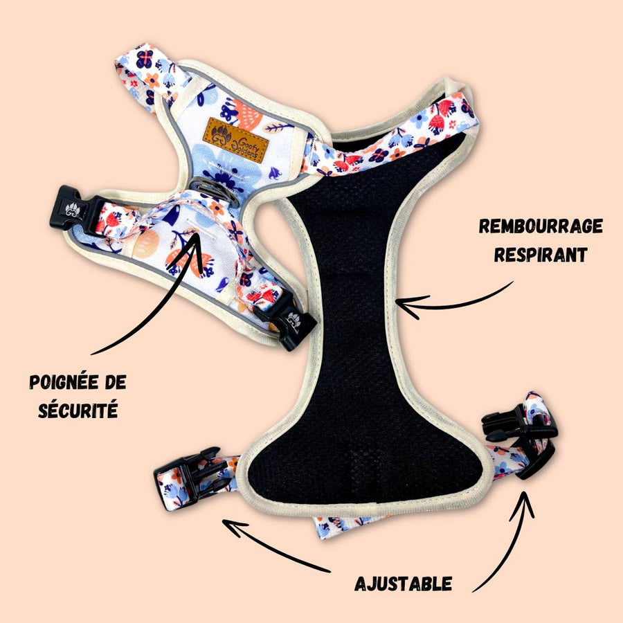 Harnais anti-traction pour chiens stylé et rembourré de la marque Goofy Goldens aux motifs fleuris dans des nuances de bleu et d'orange.