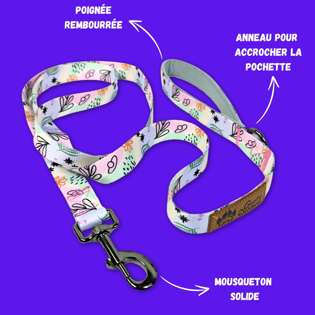 Mise en avant des motifs aux couleurs pastels Goofy Goldens ainsi que de l'anneau pour accrocher le distributeur de sacs à crottes