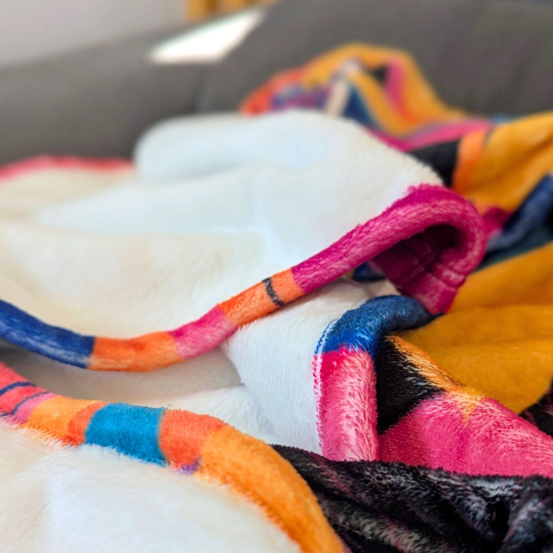 On distingue clairement la douceur et le confort du plaid Panache